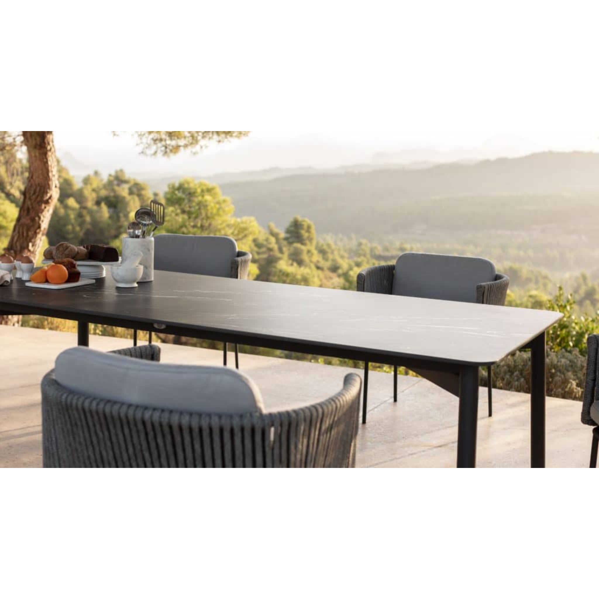 Skyline Design Boston outdoor 7-piece dining set with rectangular aluminum table and six matching chairs, ceramic top, modern outdoor furniture