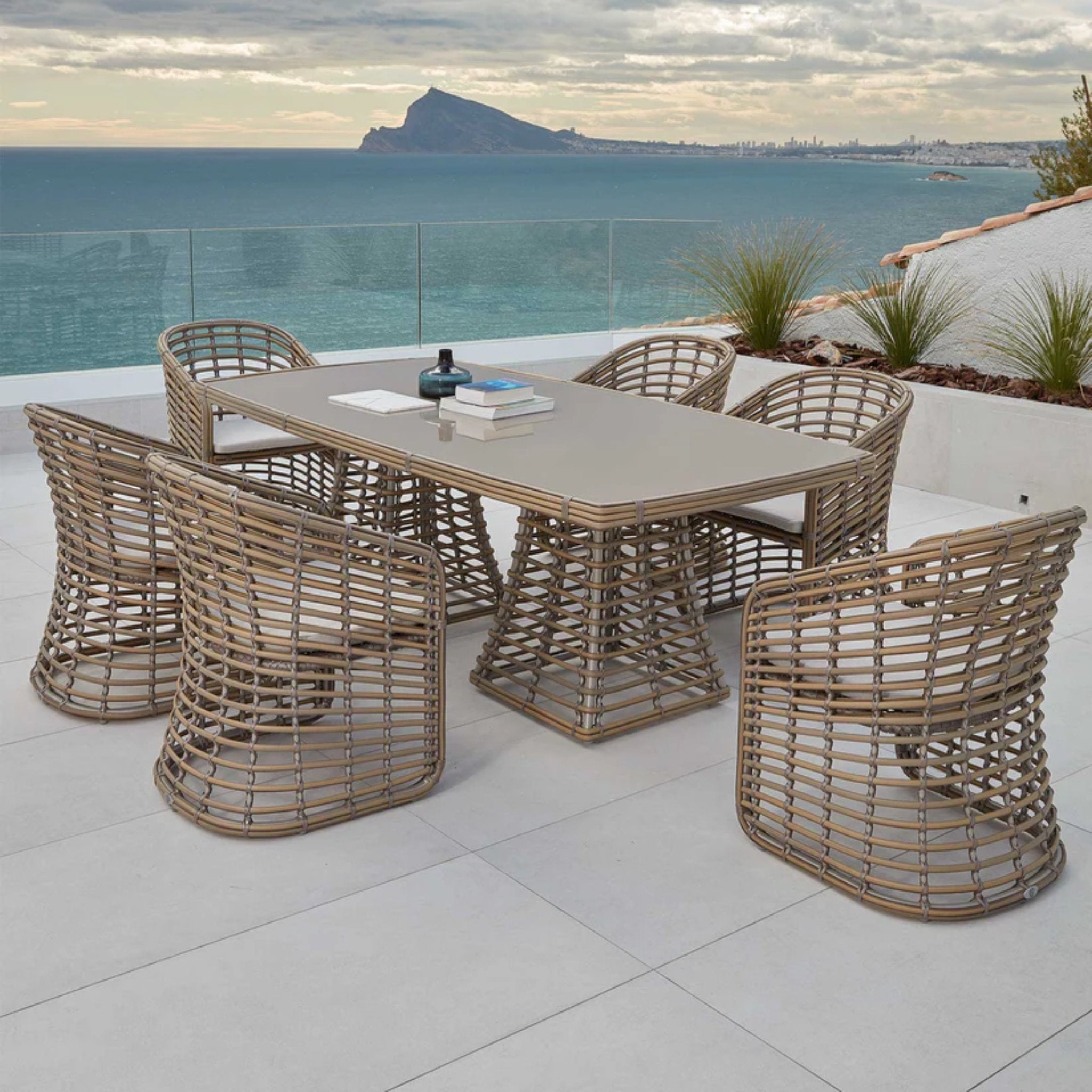 Skyline Design Ruby 7-piece outdoor dining set with rectangular table and six chairs, ideal for outdoor entertaining and patio use.