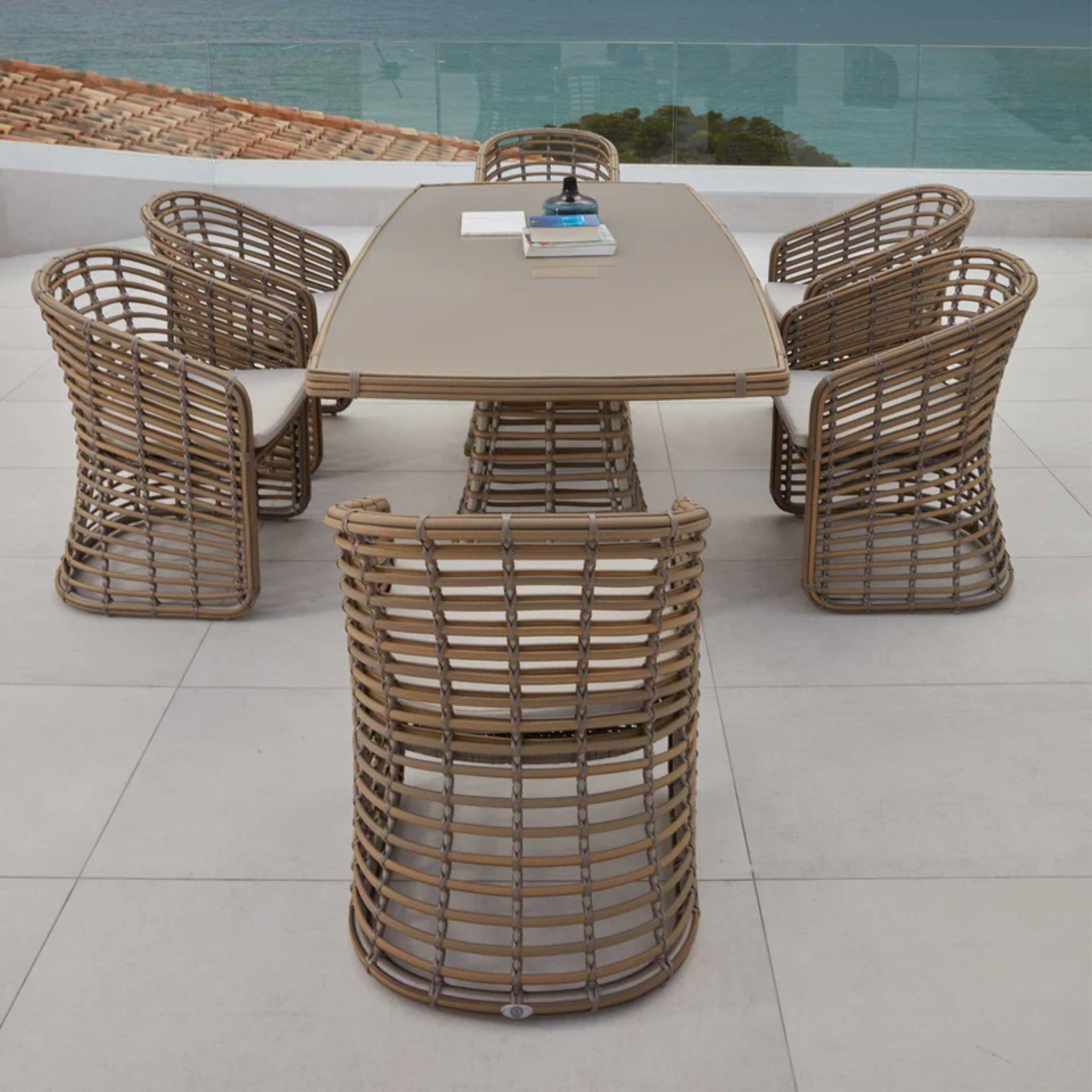 Skyline Design Ruby 7-piece outdoor dining set with rectangular table and six matching chairs, ideal for patio dining.