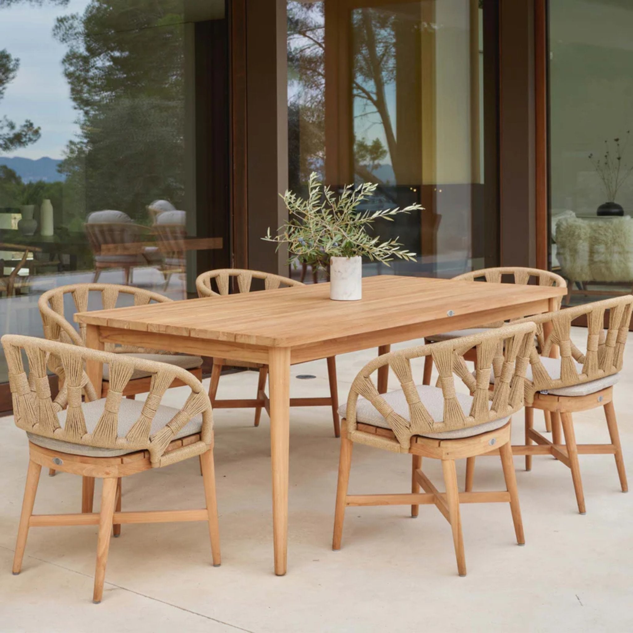 Skyline Design Krabi outdoor dining set with rectangular table and six teak chairs for outdoor patio or garden use