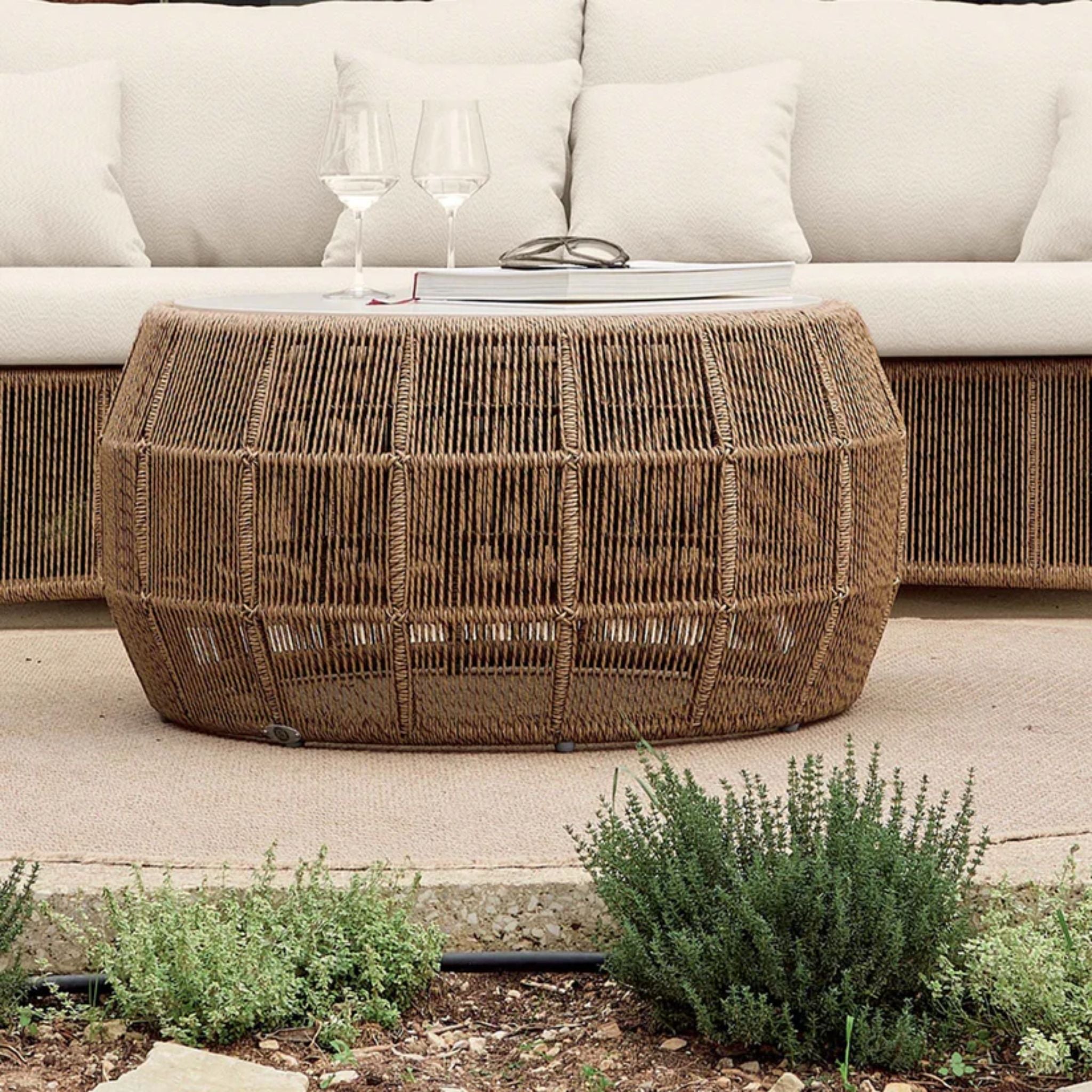 Skyline Design Calixto outdoor lounge set with sofa, chairs, and tables, featuring modern cushions and stylish outdoor furniture.
