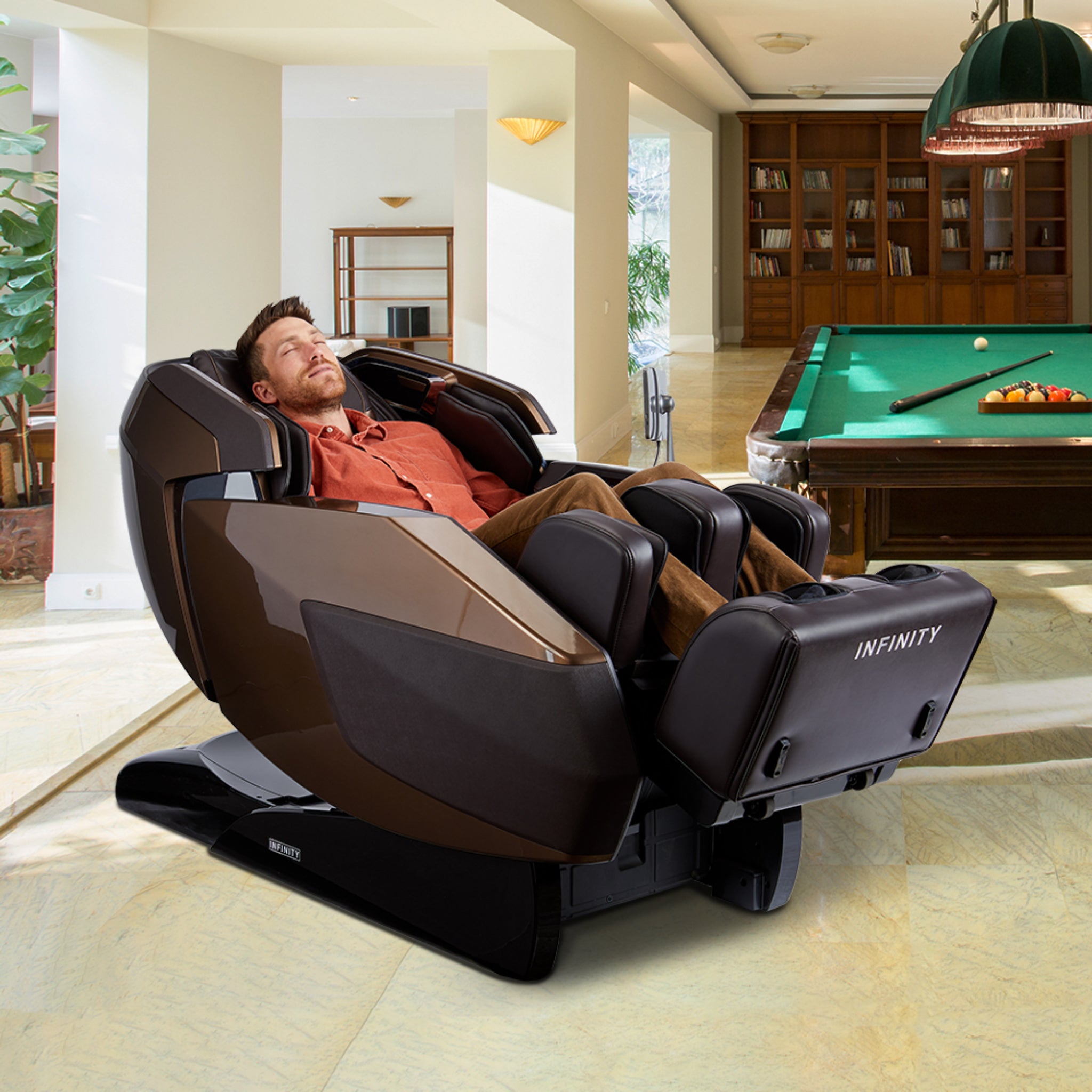 Infinity Imperial Syner-D massage chair with black leather upholstery, featuring full-body massage and zero gravity design.