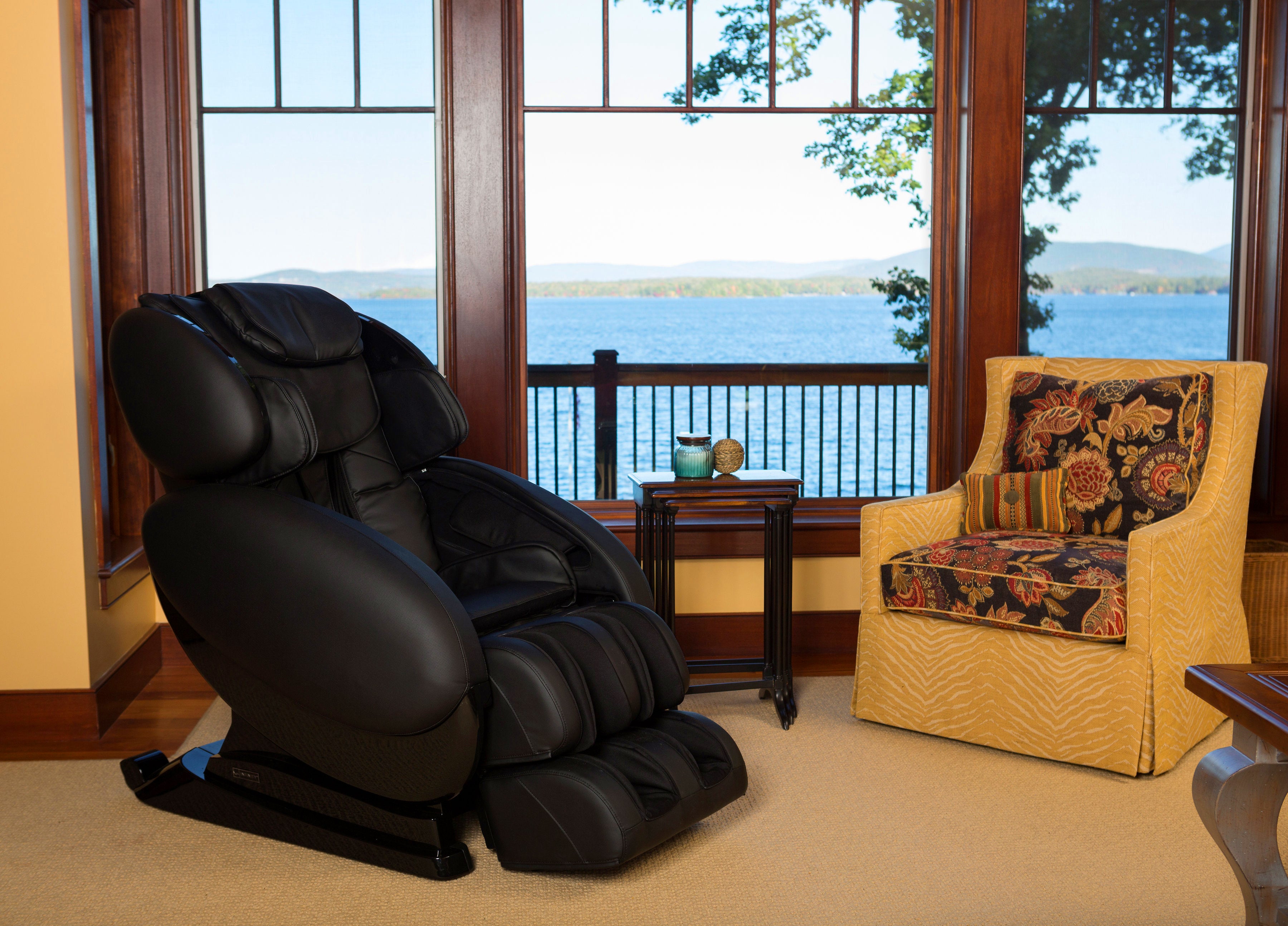 Infinity IT-8500 Plus massage chair showcasing zero gravity full body massage with sleek design and padded armrests.