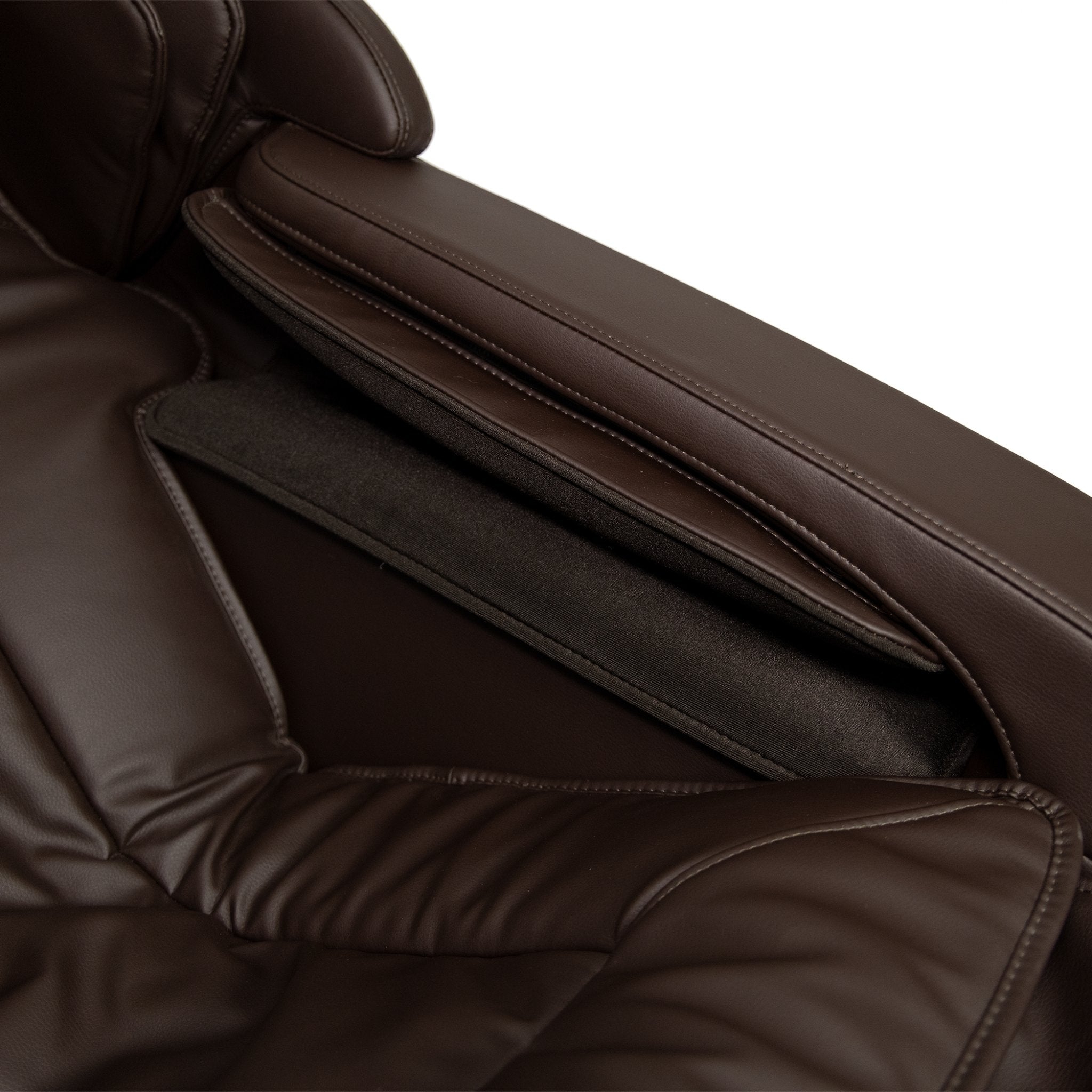 Close-up of the brown armrest on the Kyota Genki M380 full body zero gravity massage chair.