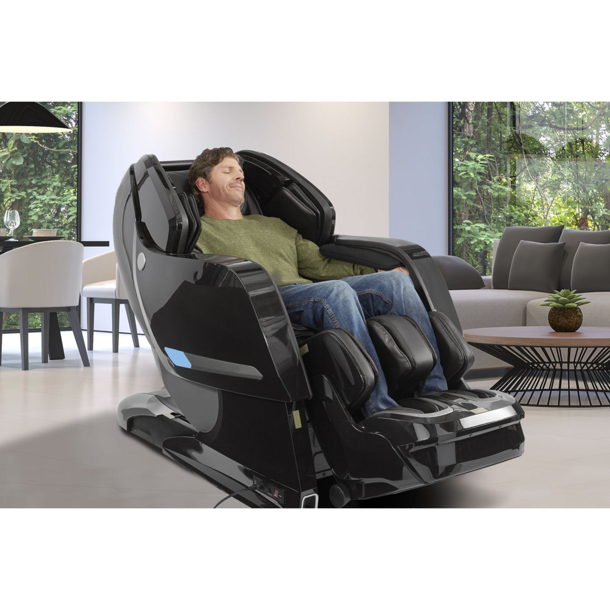 Kyota Yosei M868 black 4D full body zero gravity massage chair with a male model seated for relaxation.