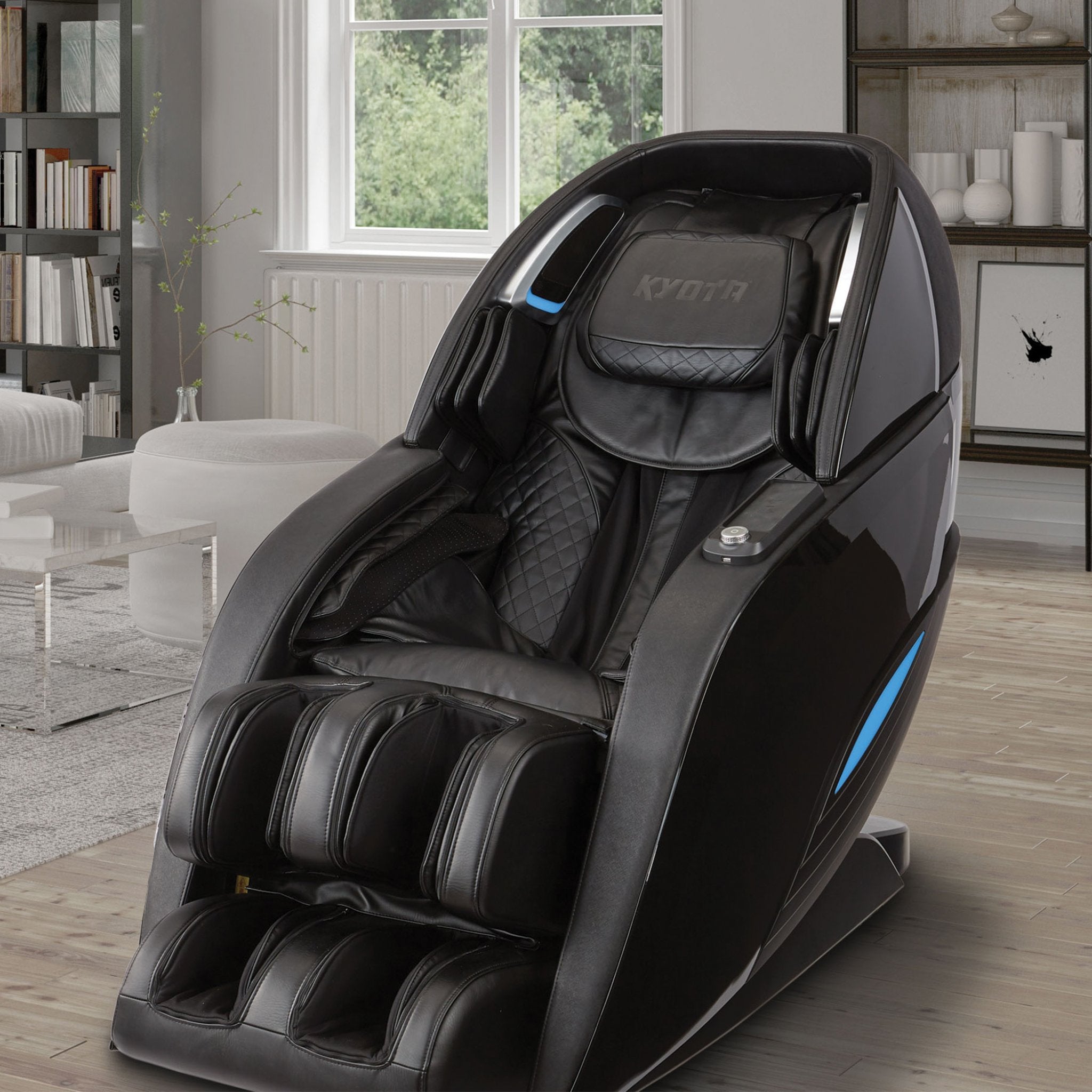 Black Kyota Yutaka M898 massage chair with full body zero gravity design and plush padding, showcasing its modern ergonomic features.