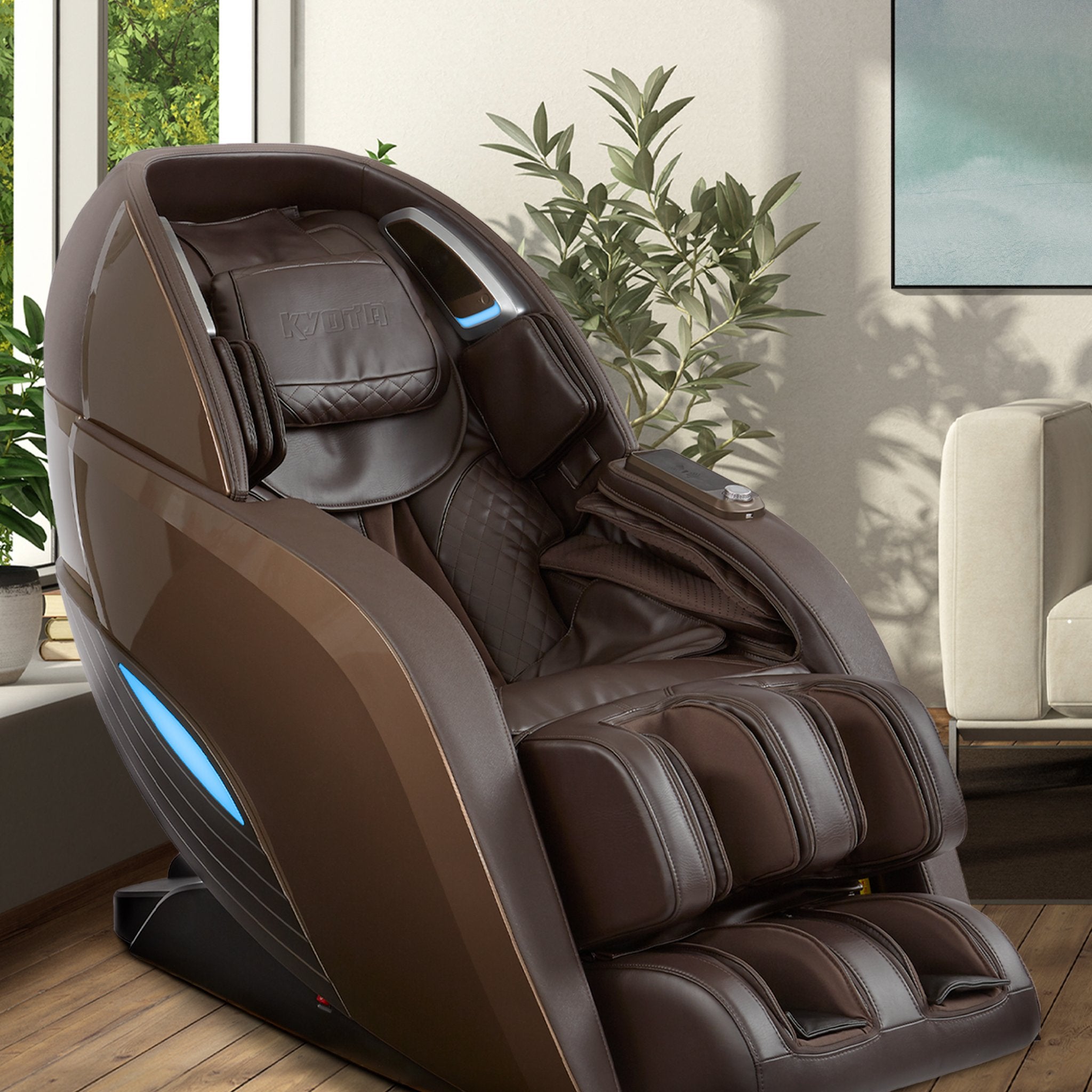 Kyota Yutaka M898 luxury full body massage chair in brown with zero gravity design, featuring padded armrests and modern style.