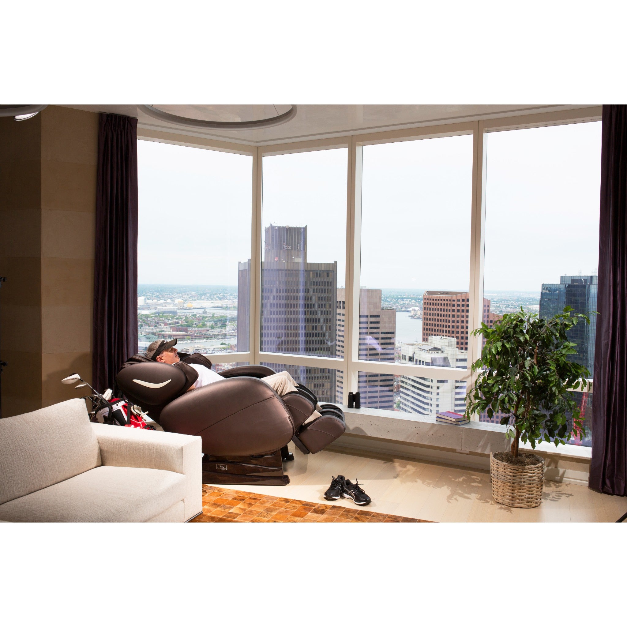 Infinity Smart Chair X3 massage chair with zero gravity design and full-body 3D/4D massage features in a modern living room setting.
