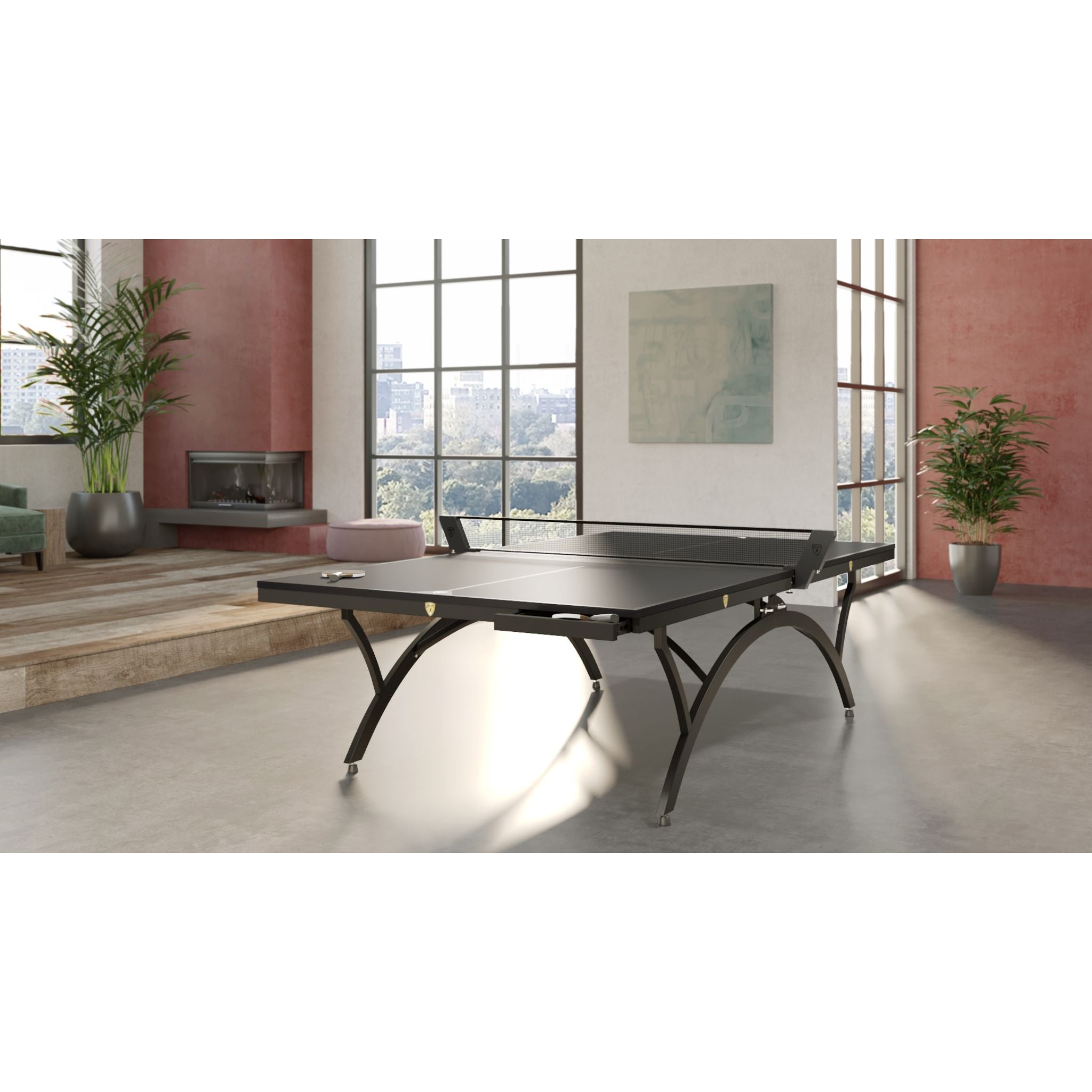 Killerspin SVR BlackWing-O indoor/outdoor ping pong table set up on a court with a net and paddles, ready for play.