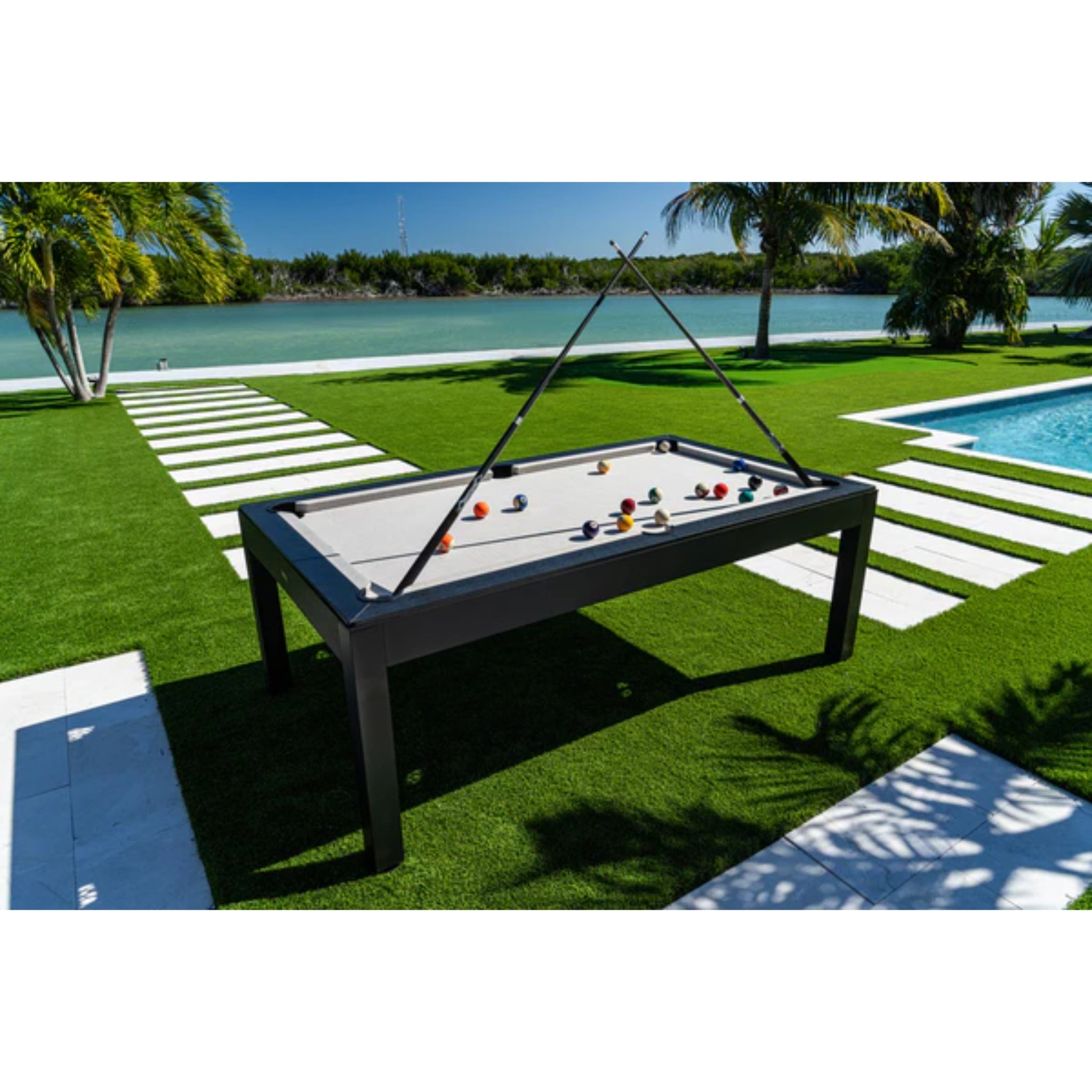 Panama Jack Outdoor weather-resistant pool table with Sunbrella cloth, outdoor billiards table for backyard entertainment.