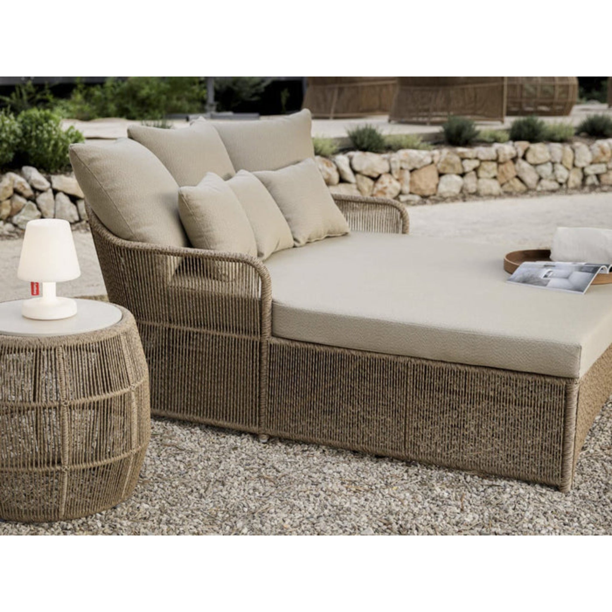 Skyline Design Calixto outdoor daybed with Nigerian twist weave, luxurious outdoor furniture for relaxation and style.