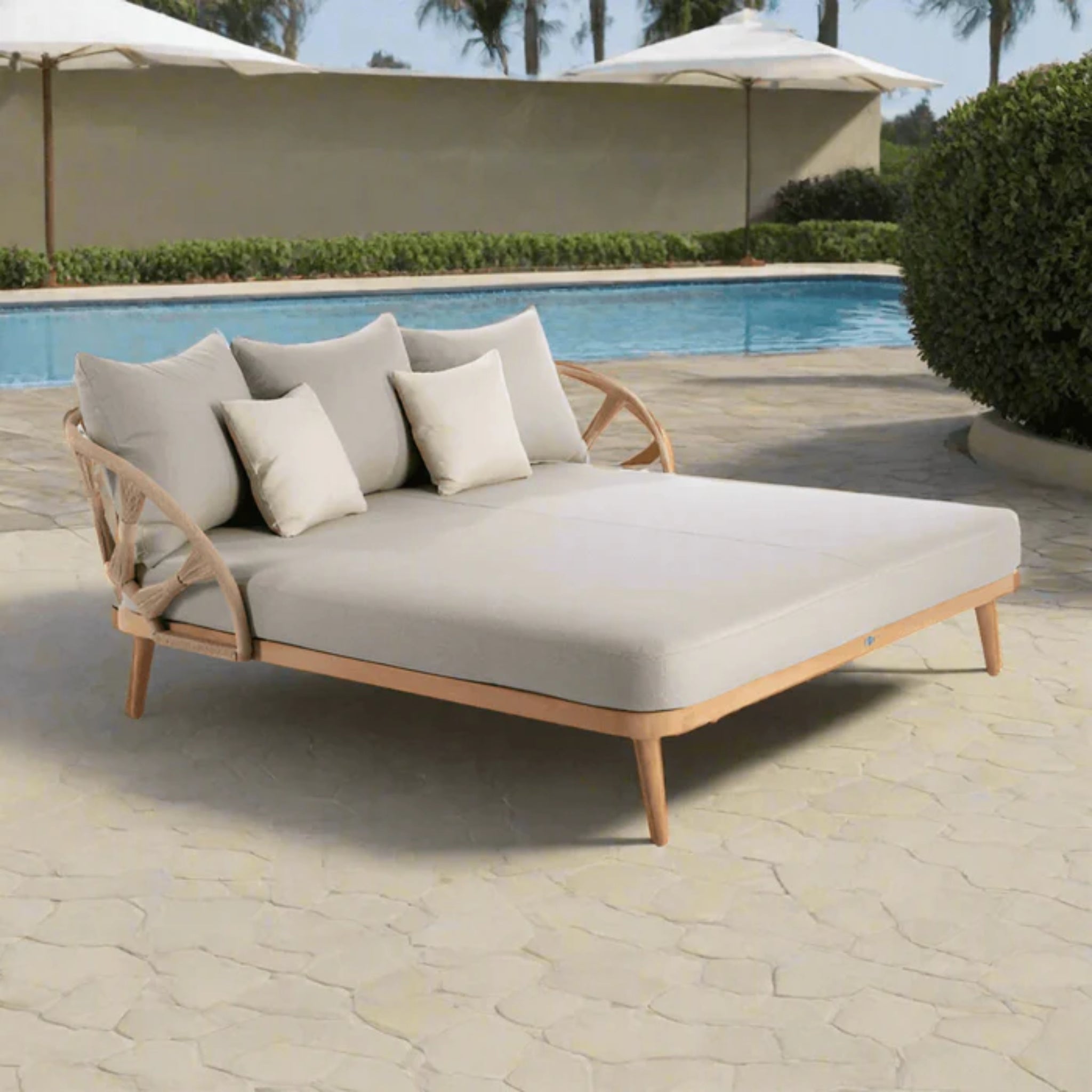 Skyline Design Krabi outdoor daybed with Rami natural rope and teak wood frame, luxurious and stylish for outdoor relaxation.