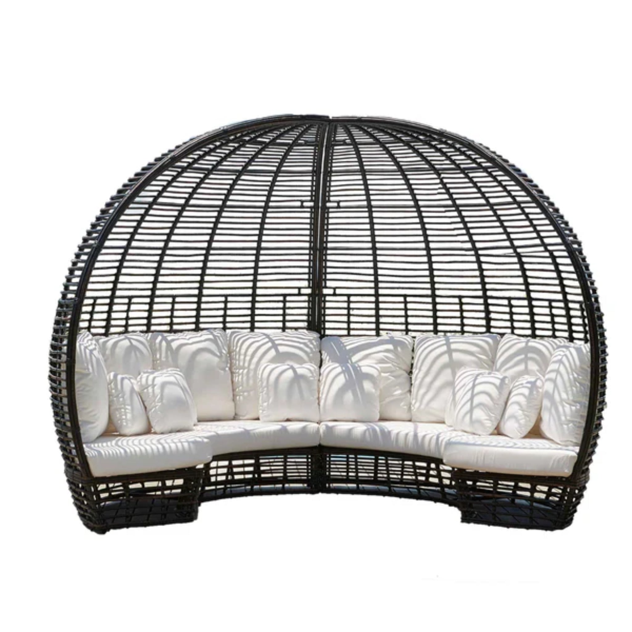 Skyline Design Nexus outdoor daybed with woven fiber in mushroom finish, featuring a built-in table for patio lounging.