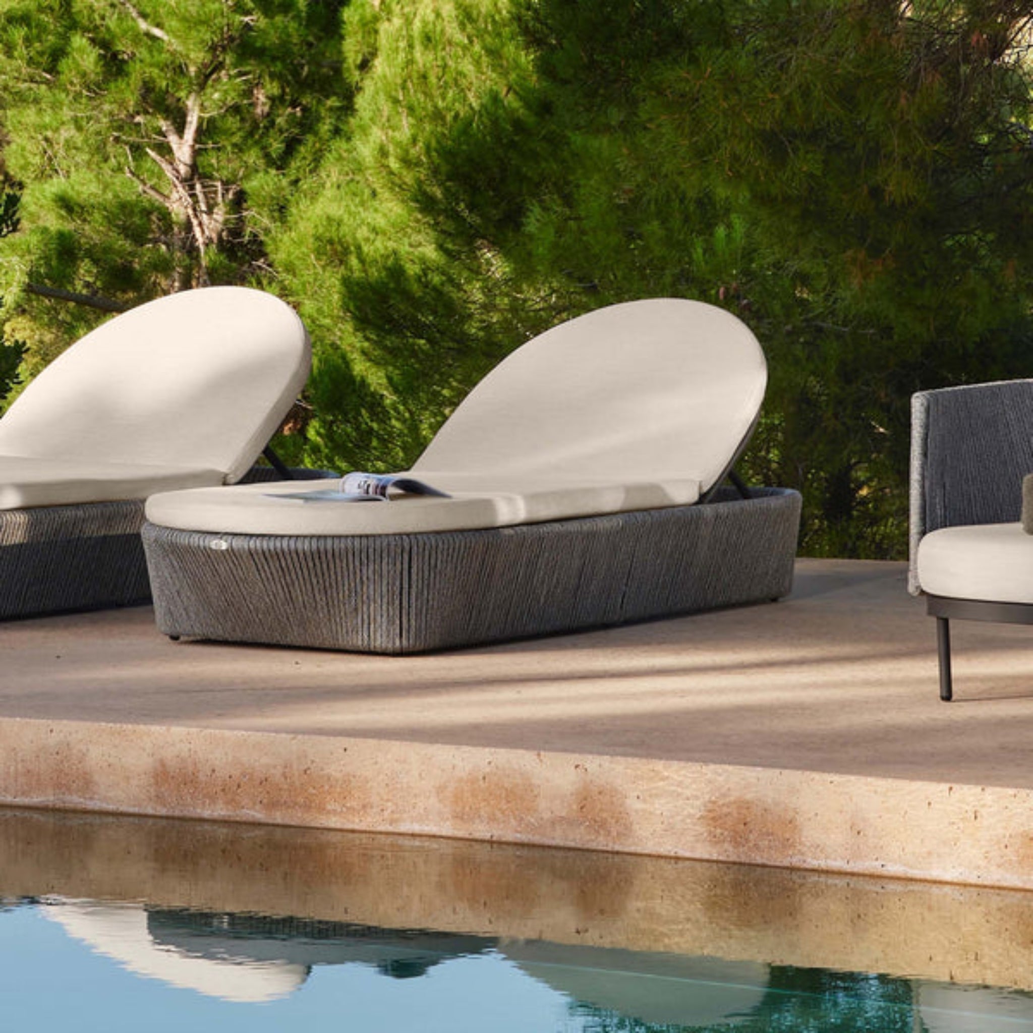 Skyline Design Boston outdoor chaise lounge with light grey strap weave and cushioned seating, ideal for poolside relaxation.