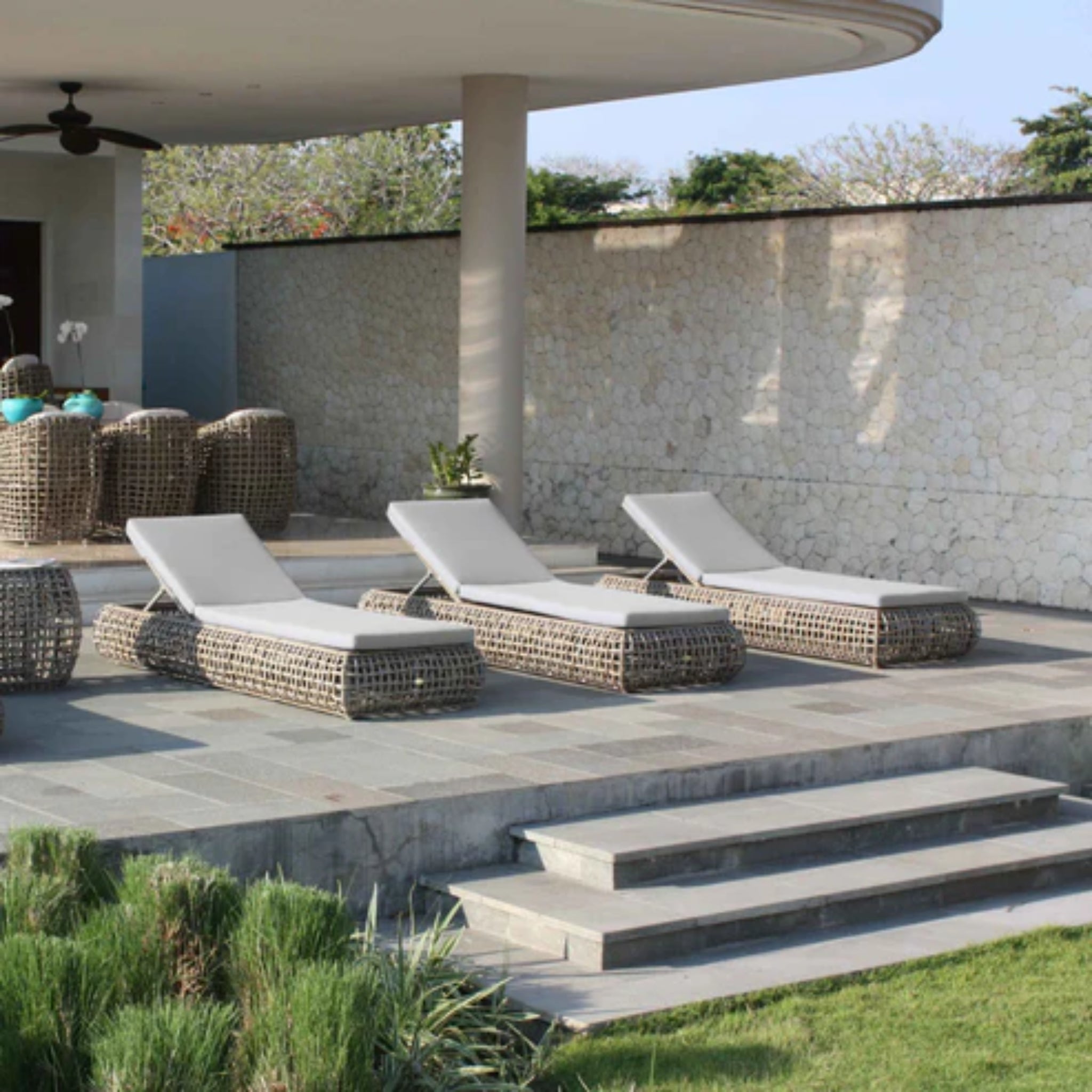 Skyline Design Dynasty outdoor lounge chair with mushroom woven fiber, patio armchair for relaxing outdoor seating.