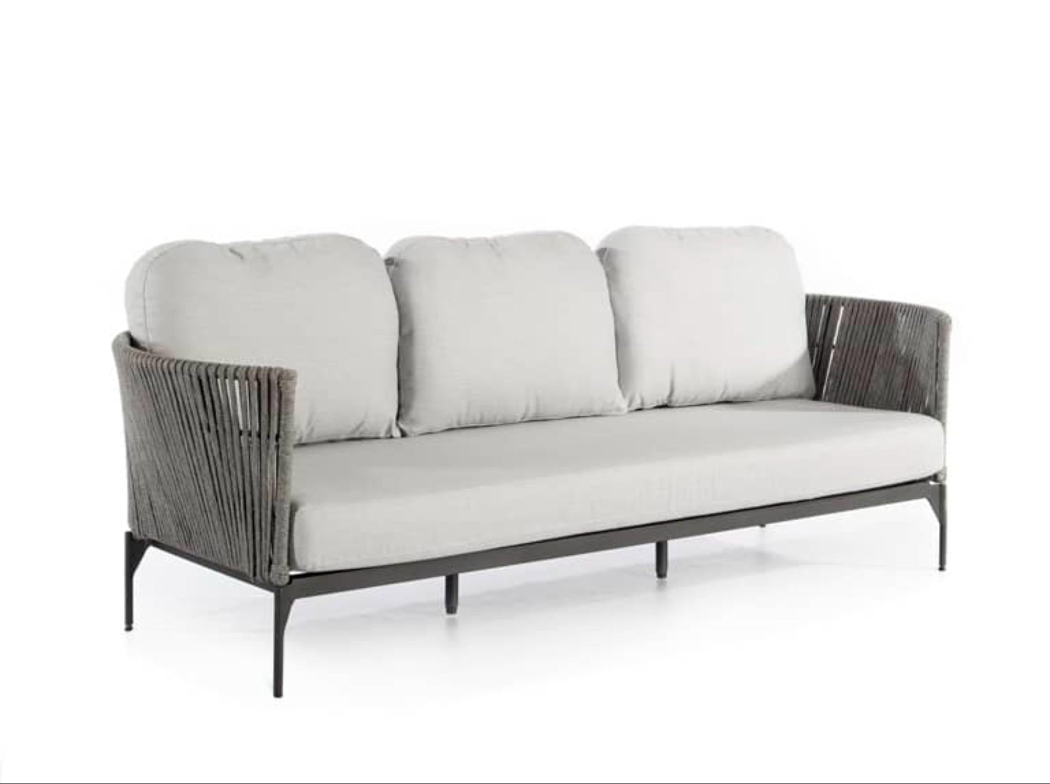 Skyline Design Boston outdoor lounge set with light grey woven sofa, chairs, and tables for stylish outdoor seating.