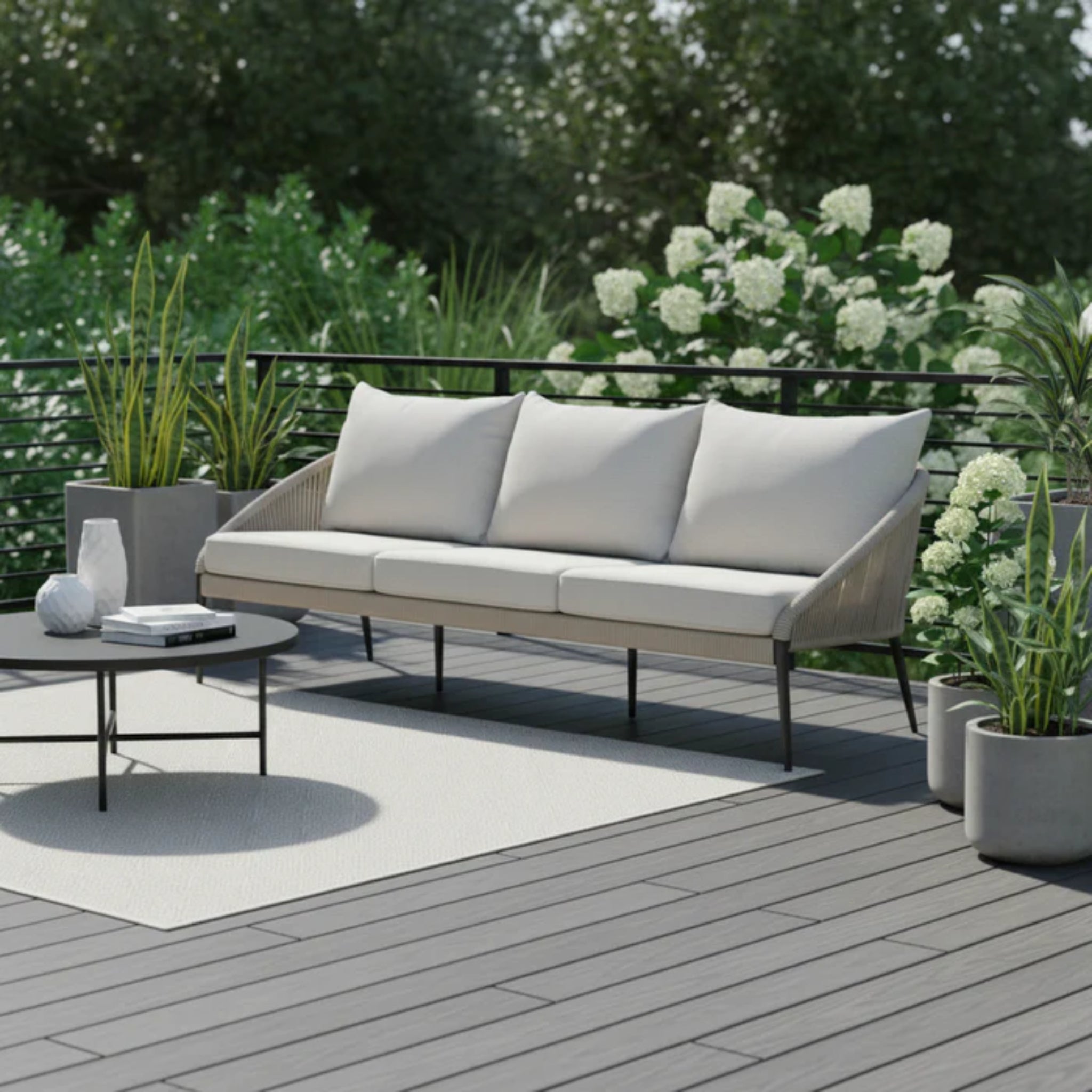 Skyline Design Rodona outdoor lounge set with silver-grey sofa, chairs, and coffee table for stylish outdoor seating.