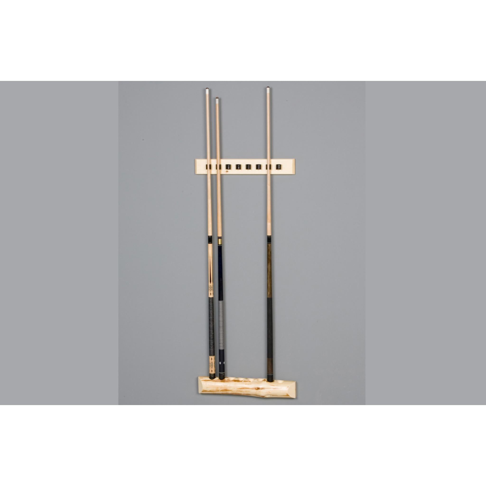 Viking Log Furniture Klondike cue rack with four styles, made of wood, holding pool cues, on a clear floor.